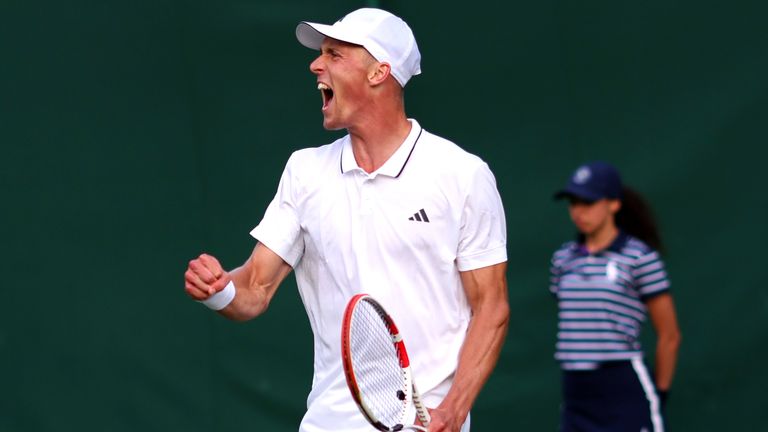 Jan Choinski celebrates winning his Gentlemen&#39;s Singles match against Dusan Lajovic on day one of the 2023 Wimbledon Championships at the All England Lawn Tennis and Croquet Club in Wimbledon. Pictur