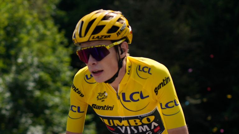 Denmark's Jonas Vingegaard, wearing the overall leader's yellow jersey, follows teammates Netherlands' Wilco Kelderman during the twentieth stage of the Tour de France cycling race over 133.5 kilometers (83 miles) with start in Belfort and finish in Le Markstein Fellering, France, Saturday, July 22, 2023. (AP Photo/Thibault Camus)