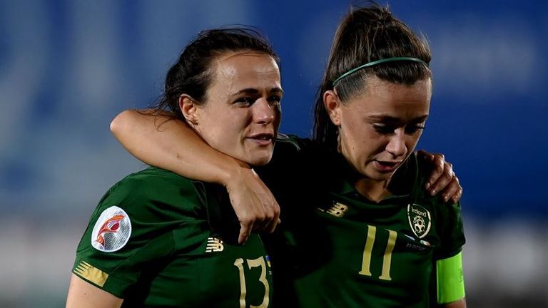 Katie McCabe commiserates with her teammate after the Republic of Ireland missed out of qualification for Euro 2022