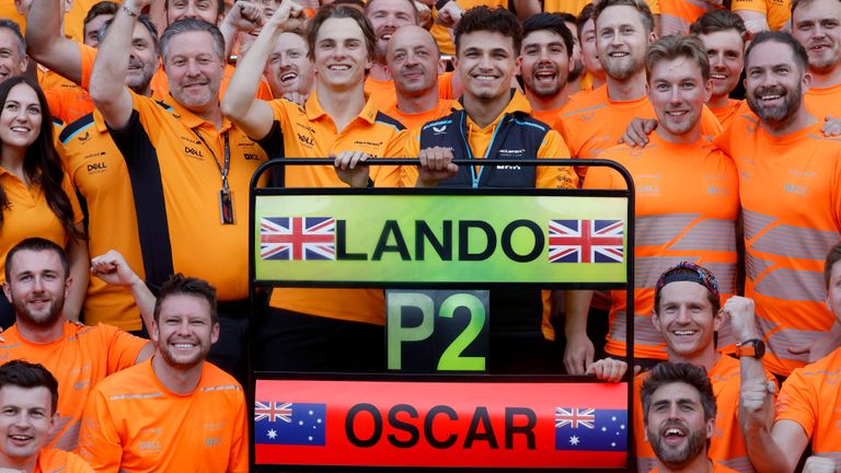 SILVERSTONE CIRCUIT, UNITED KINGDOM - JULY 09: Zak Brown, CEO, McLaren Racing, Oscar Piastri, McLaren, Lando Norris, McLaren, 2nd position, and the McLaren team celebrate after the race during the British GP at Silverstone Circuit on Sunday July 09, 2023 in Northamptonshire, United Kingdom. (Photo by Glenn Dunbar / LAT Images)