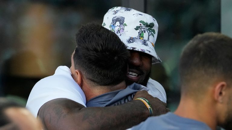 LA Lakers superstar LeBron James hugs Lionel Messi before the soccer legend's debut for Inter Miami (AP Photo/Lynne Sladky)
