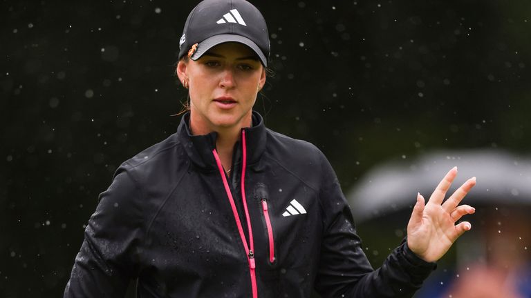 Linn Grant waves to the crowd after sinking her putt on the fourth hole during the third round of the Dana Open in Ohio. (Rebecca Benson/The Blade via AP)