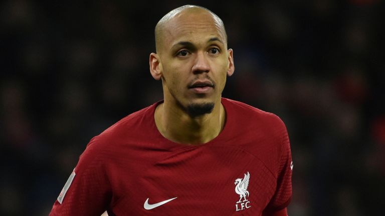 Liverpool's Fabinho, left, stands on the pitch during the English FA Cup 3rd round replay soccer match between Wolverhampton Wanderers and Liverpool at Molineux stadium in Wolverhampton, England, Tuesday Jan. 17, 2023. (AP Photo/Rui Vieira)