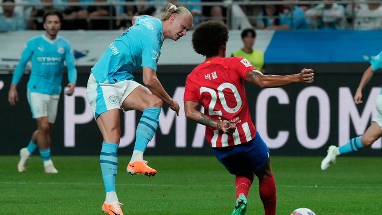 Erling Haaland shoots during Man City's friendly defeat to Atletico Madrid in Seoul, South Korea