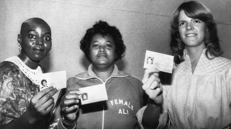 Marian Tremiar, left, Jackie Tonawanda, center, and Cathy "Cat" Davis hold their newly issued boxing licenses on Sept. 19, 1978, in New York. The licenses were issued by the New York State Athletic Commission, in the light of a recent State Supreme Court ruling that women could not be denied access to the ring. (AP Photo/Ray Howard)