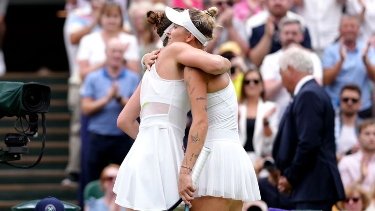 Marketa Vondrousova consoles Elina Svitolina (left) at the net following the Ladies Singles - Semi Final on day eleven of the 2023 Wimbledon Championships at the All England Lawn Tennis and Croquet Club in Wimbledon. Picture date: Thursday July 13, 2023.