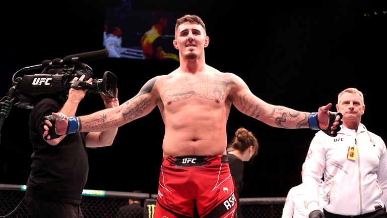 Tom Aspinall celebrates victory against Alexander Volkov in the Heavyweight bout at The O2, London. Picture date: Saturday March 19, 2022.
