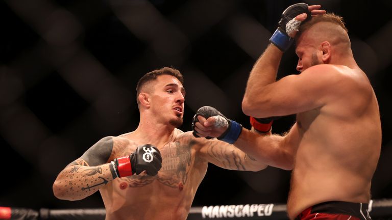Tom Aspinall (L) defeated Marcin Cybura at UFC London (PA Images)
