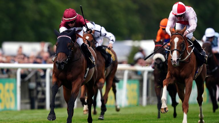 Naomi Lapaglia gets her head in front in the Bedford Lodge Hotel & Spa Fillies' Handicap at Newmarket