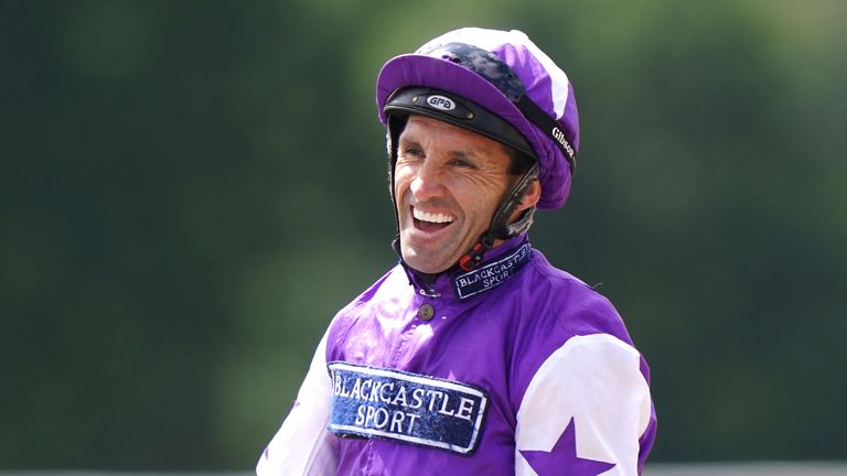 Neil Callan is all smiles after Calling The Wind&#39;s victory in the Northumberland Plate