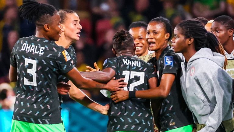 Nigeria players celebrate after teammate Uchenna Kanu, third left, scored their side's first goal during the Women's World Cup Group B soccer match between Australia and Nigeria In Brisbane, Australia, Thursday, July 27, 2023. (AP Photo/Tertius Pickard)