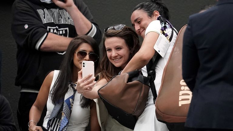 Ons Jabeur poses for a picture with fans after her win against Magdalena Frech (not pictured) on day two of the 2023 Wimbledon Championships at the All England Lawn Tennis and Croquet Club in Wimbledon. Picture date: Tuesday July 4, 2023.