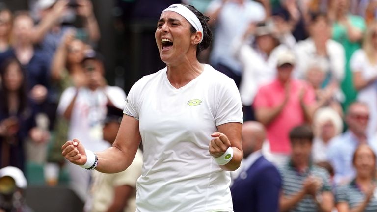 Ons Jabeur celebrates victory over Elena Rybakina following the ladies' quarter-finals match on day ten of the 2023 Wimbledon Championships at the All England Lawn Tennis and Croquet Club in Wimbledon. Picture date: Wednesday July 12, 2023.