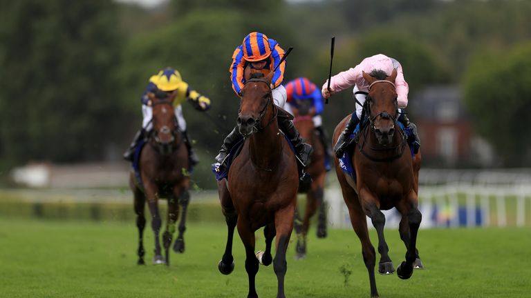 Paddington (left) sees off Emily Upjohn to win the Coral-Eclipse at Sandown