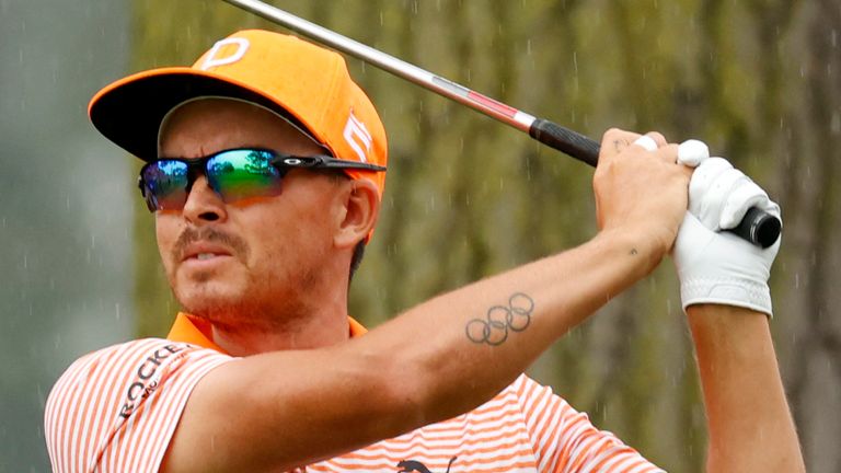 DETROIT, MI - JULY 02: PGA golfer Rickie Fowler hits his tee shot on the 5th hole on July 2, 2023, during the final round of the Rocket Mortgage Classic at the Detroit Golf Club in Detroit, Michigan. (Photo by Brian Spurlock/Icon Sportswire) (Icon Sportswire via AP Images)