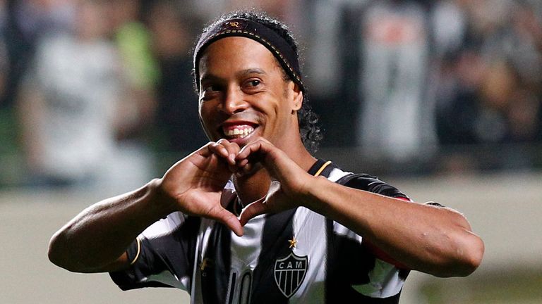 Brazil's Atletico Mineiro's Ronaldinho celebrates his team's victory over Argentina's Newell's Old Boys at the end of a Copa Libertadores semifinal soccer match in Belo Horizonte, Brazil. 