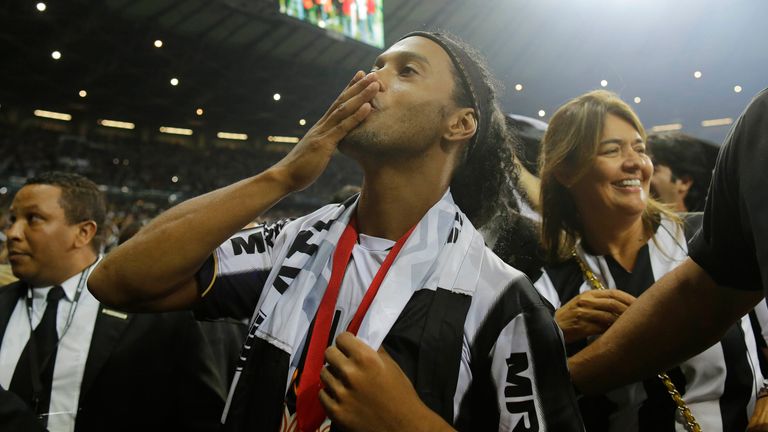 Ronaldinho Gaucho of Brazil's Atletico Mineiro blows a kiss to the crowds after winning the Copa Libertadores championship in a match against Paraguay's Olimpia in Belo Horizonte, Brazil, Wednesday, July 24, 2013