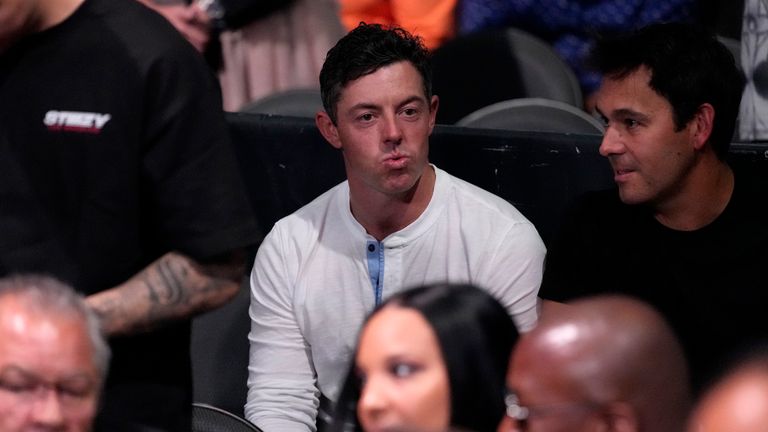 PGA golfer Rory McIlroy watches Terence Crawford and Errol Spence Jr. prepare to fight in their undisputed welterweight championship boxing match, Saturday, July 29, 2023, in Las Vegas. (AP Photo/John Locher)