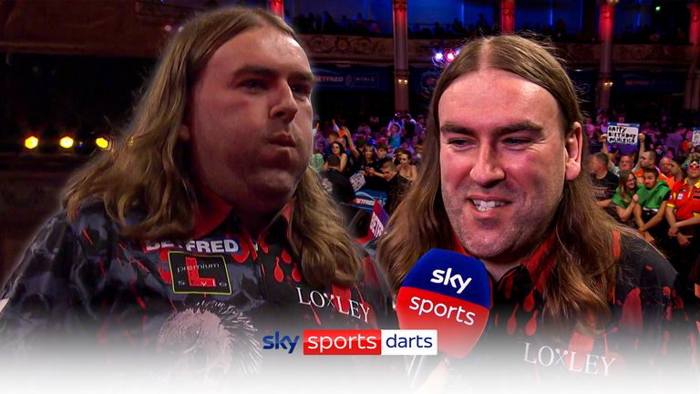 Ryan Searle celebrates after beating Peter Wright at the World Matchplay