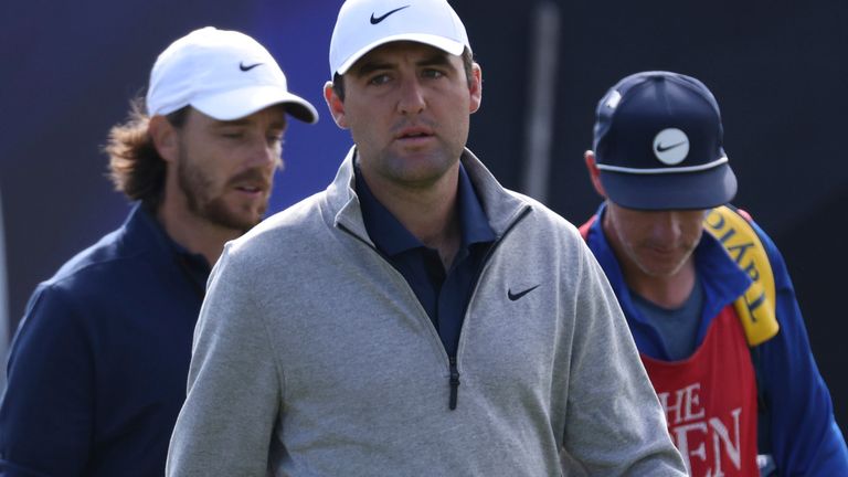 United States' Scottie Scheffler walks from the 1st tee on the first day of the British Open Golf Championships at the Royal Liverpool Golf Club in Hoylake, England, Thursday, July 20, 2023. (AP Photo/Peter Morrison)