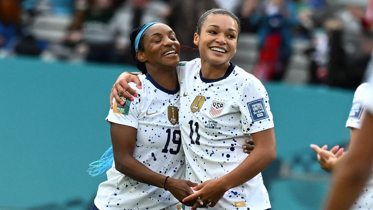 United States' Sophia Smith, right, celebrates with United States' Crystal Dunn after scoring her side's 2nd goal during the Women's World Cup Group E soccer match between the United States and Vietnam at Eden Park in Auckland, New Zealand, Saturday, July 22, 2023. (AP Photo/Andrew Cornaga)