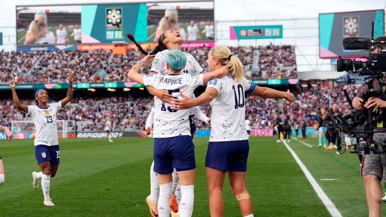 United States' Lindsey Horan (10), Megan Rapinoe (15) and Sophia Smith top, celebrate after Horan scored their third goal during the second half of the Women's World Cup Group E soccer match between the United States and Vietnam at Eden Park in Auckland, New Zealand, Saturday, July 22, 2023. (AP Photo/Abbie Parr)