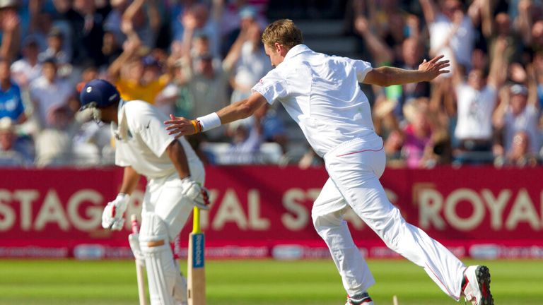 England's Stuart Broad. right, celebrates taking a hat-trick with the wicket of India's Praveen Kumar, left. for no runs on the second day of their cricket Test match at Trent Bridge cricket ground, Nottingham, England, Saturday July 30, 2011. (AP Photo/Jon Super)