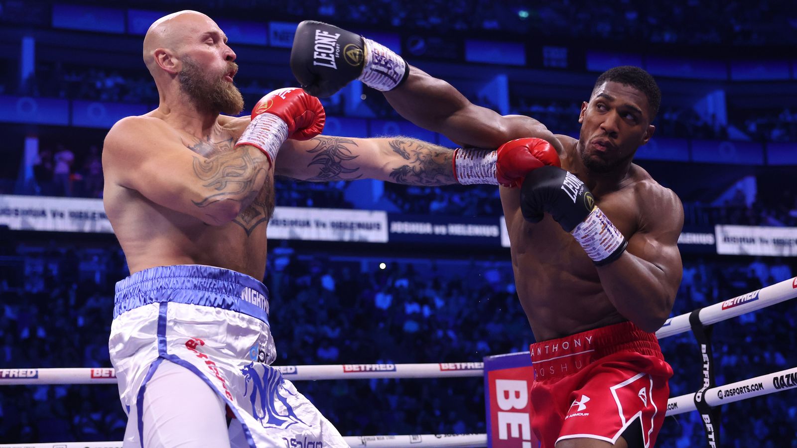 Anthony Joshua blasts Robert Helenius down and out in seven rounds