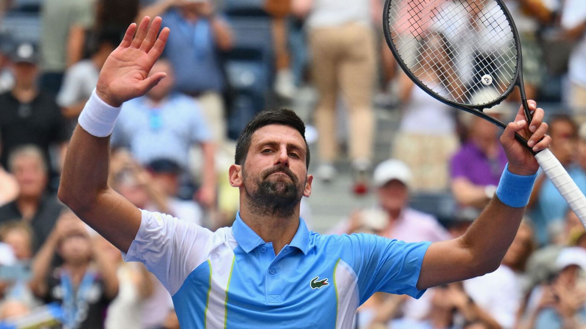 Djokovic eases through as Stricker stuns Tsitsipas in New York