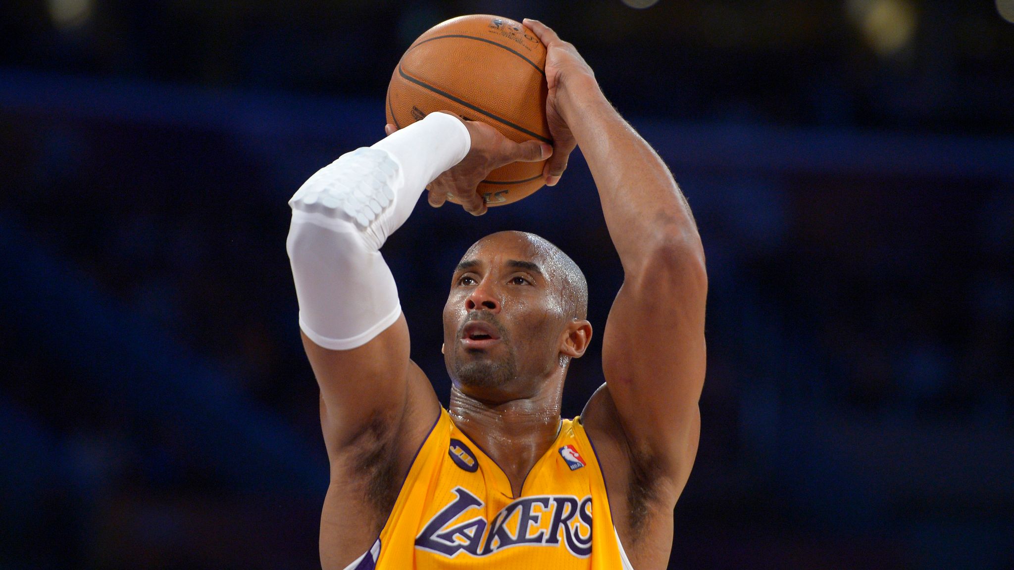 Former Los Angeles Laker Kobe Bryant watches during the eighth