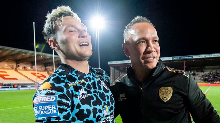 Picture by Allan McKenzie/SWpix.com - 03/03/2023 - Rugby League - Betfred Super League Round 3 - Hull KR v Leigh Leopards - Sewell Group Craven Park, Hull, England - Leigh's coach Adrian Lam celebrates with son Lachlan after his side's last minute victory over Hull KR to give them their first win in the Betfred Super League.