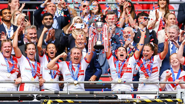 Picture by Will Palmer/SWpix.com - 12/08/2023 - Rugby League - Betfred Women's Challenge Cup Final - Leeds Rhinos v St Helens - Wembley Stadium, London, England - Jodie Cunningham and Emily Rudge of St.Helens lift the Challenge Cup Trophy after victory over Leeds Rhinos in the Betfred Women's Challenge Cup Final