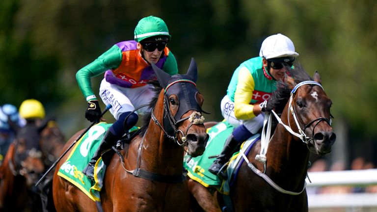 Quinault and jockey Connor Planas (left) on their way to winning the bet365 Handicap at Newmarket