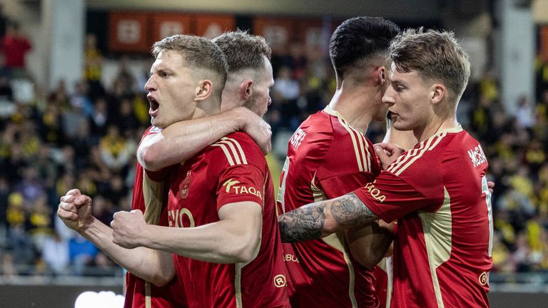 GOTHENBURG, SWEDEN - AUGUST 24: Aberdeen players celebrate with Nicky Devlin after he makes it 2-2 during a UEFA Europa League Play-Off Round match between BK Hacken and Aberdeen at Bravida Arena, on August 24, 2023, in Gothenburg, Sweden. (Photo by Craig Foy / SNS Group)