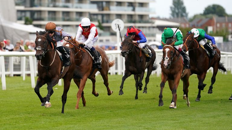 Action Point (left) wins wins The Ire-Incentive - It Pays To Buy Irish Rose Bowl Stakes at Newbury under Doyle