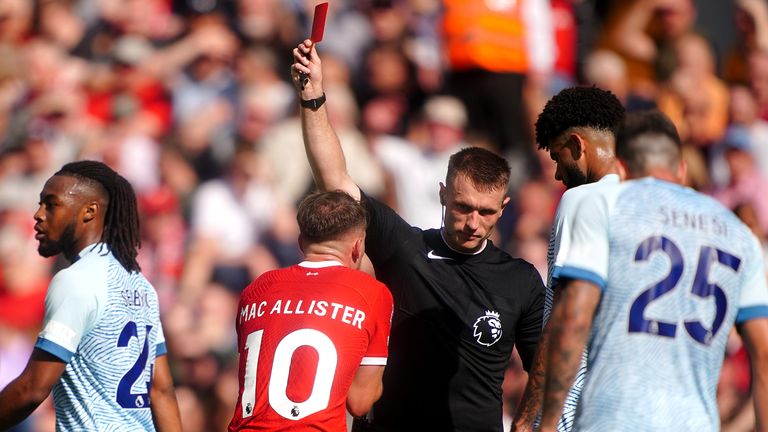 Alexis Mac Allister is shown a red card by referee Thomas Bramall in Liverpool's victory over Bournemouth.