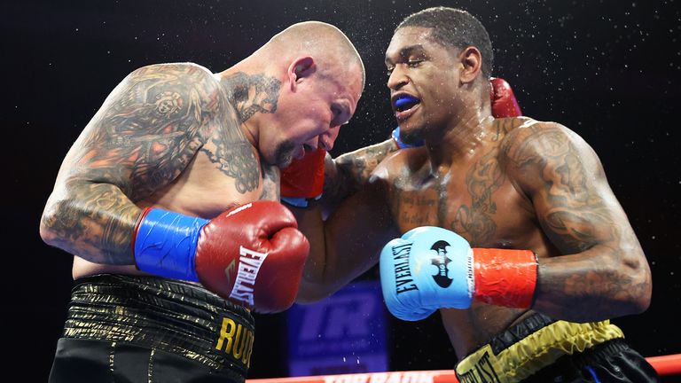 TULSA, OKLAHOMA - AUGUST 26: Andriy Rudenko (L) of Ukraine and Jared Anderson (R) exchange punches during their heavyweight fight at Hard Rock Live on August 26, 2023 in Tulsa, Oklahoma. (Photo by Mikey Williams/Top Rank Inc via Getty Images)