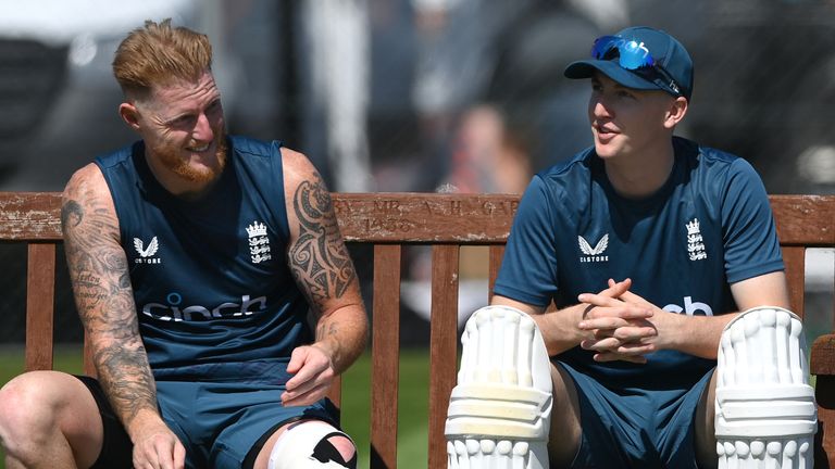 BIRMINGHAM, ENGLAND - JUNE 14: England player Harry Brook (r) shares a joke with Ben Stokes as they sit on the bench during England nets ahead of the first Ashes Test Match at Edgbaston on June 14, 2023 in Birmingham, England. (Photo by Stu Forster/Getty Images)