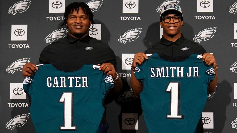 Newly drafted Philadelphia Eagles' Jalen Carter, left, and Nolan Smith pose for a photo after a news conference at the NFL football team's training facility, Friday, April 28, 2023, in Philadelphia. (AP Photo/Matt Slocum)