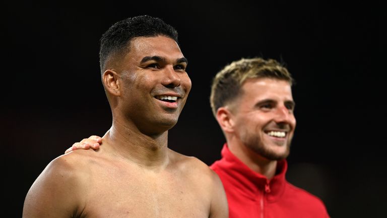 Casemiro and Mason Mount of Manchester United celebrate the team&#39;s victory following the Premier League match between Manchester United and Wolverhampton Wanderers at Old Trafford on August 14, 2023 in Manchester,