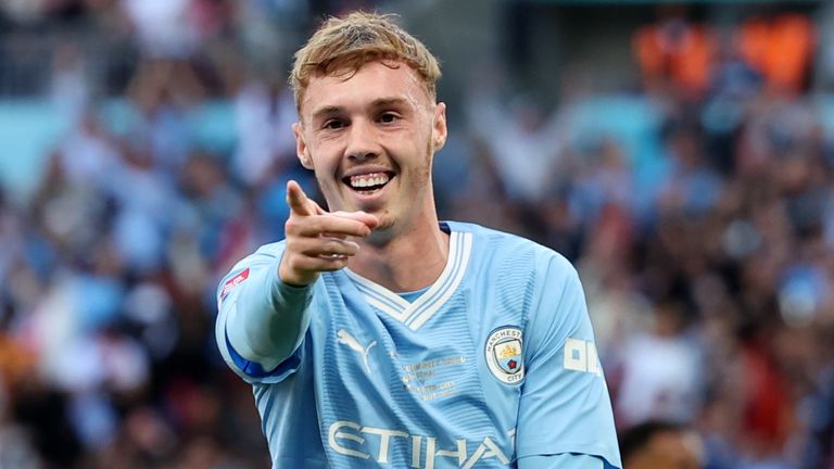 Cole Palmer celebrates after breaking Community Shield stalemate with stunning strike