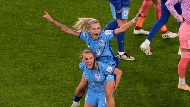 England's Rachel Daly and England's Georgia Stanway celebrate after the Women's World Cup semifinal soccer match between Australia and England at Stadium Australia in Sydney, Australia