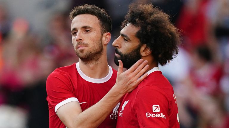 Liverpool's Diogo Jota celebrates with Mohamed Salah after scoring their side's second goal vs SV Darmstadt 98