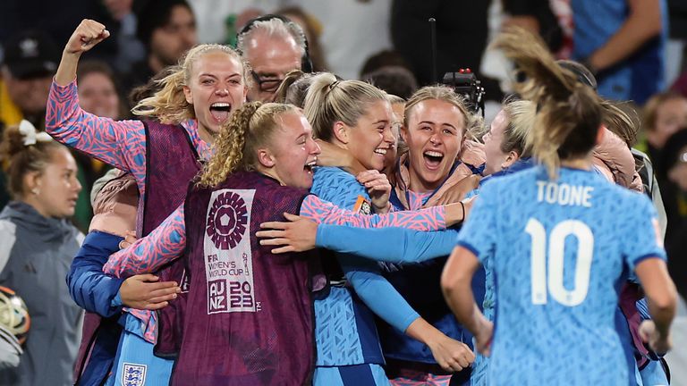 England players celebrate Alessia Russo's goal