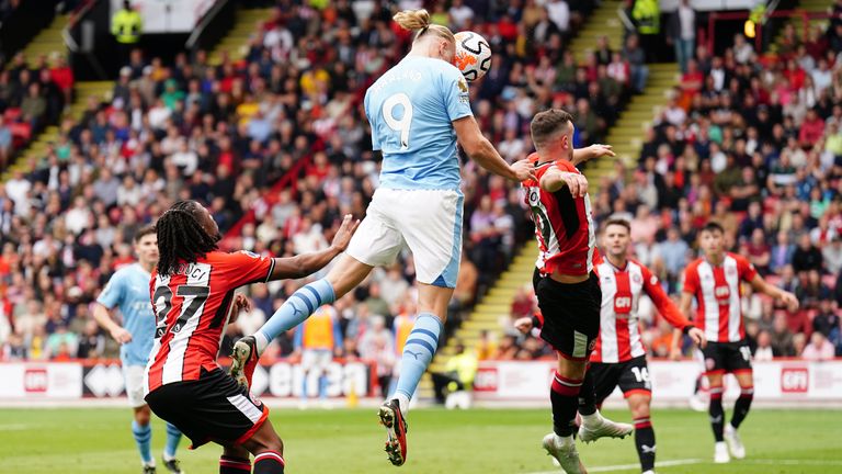 Erling Haaland heads Man City in front