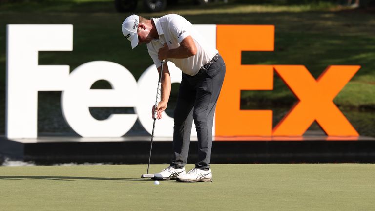 Lucas Glover makes a putt during the third round of the FedEx St. Jude Championship