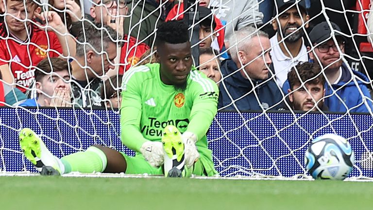 Andre Onana reacts after being beaten from long range during Manchester United&#39;s pre-season friendly against Lens