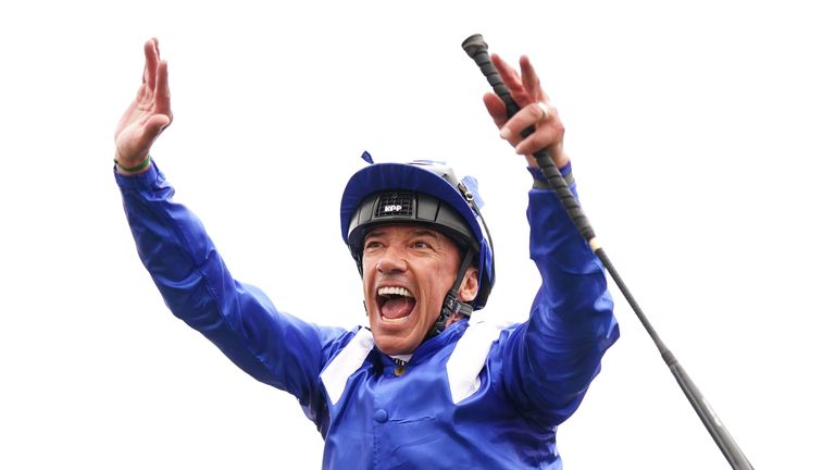 Frankie Dettori performs his famous flying dismount from Mostahdaf