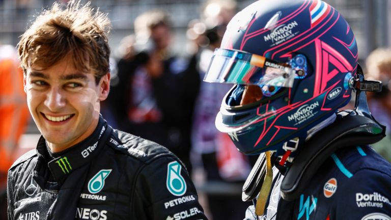 CIRCUIT ZANDVOORT, NETHERLANDS - AUGUST 26: George Russell, Mercedes-AMG, and Alex Albon, Williams Racing, talk in Parc Ferme after Qualifying during the Dutch GP at Circuit Zandvoort on Saturday August 26, 2023 in North Holland, Netherlands. (Photo by Zak Mauger / LAT Images)