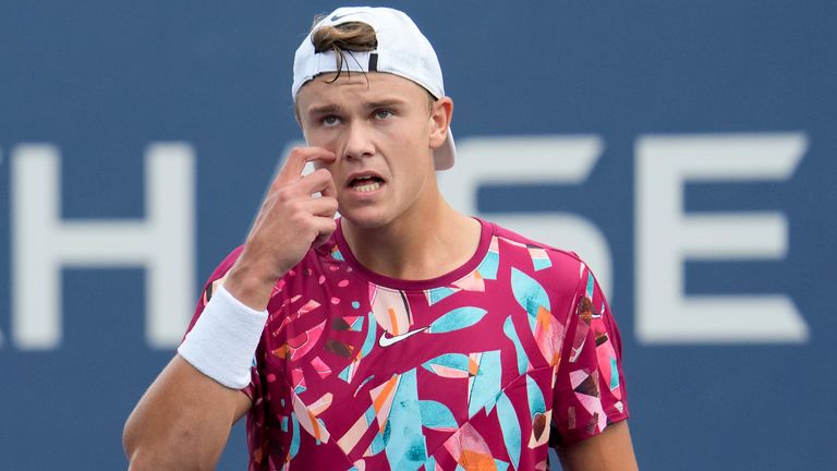 Holger Rune, of Denmark, reacts during a match against Roberto Carballes Baena, of Spain, during the first round of the U.S. Open tennis championships, Monday, Aug. 28, 2023, in New York. (AP Photo/John Minchillo)
